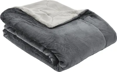 A folded blanket on a white background.