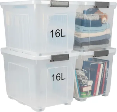 Four clear plastic storage boxes stacked and arranged.