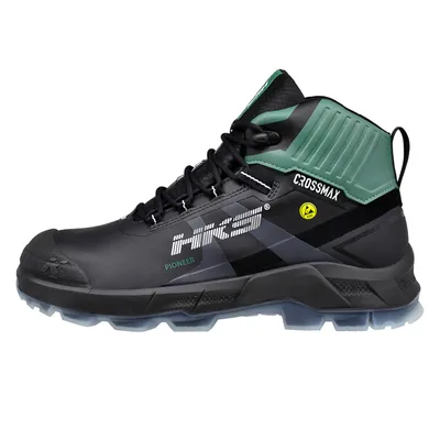 A side view of a black and green work boot.