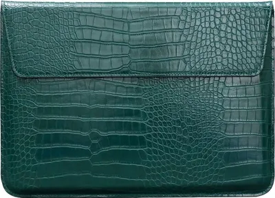 A close-up, flat lay image of a green laptop sleeve with a crocodile-like texture.