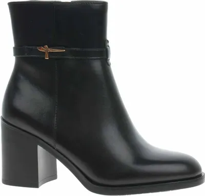 A single black leather boot with a block heel and a decorative strap with a gold buckle.