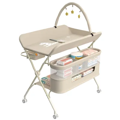 Image de Table à langer réglable en hauteur sur roulettes avec 5 marches, sidebags et jouets - pliable, peu encombrante en beige.