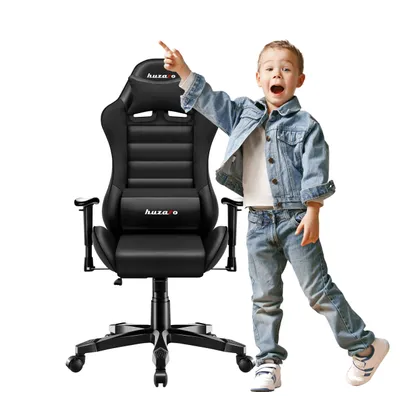 A child standing next to a gaming chair.