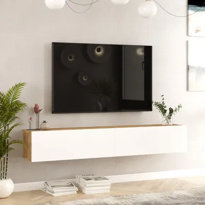 A modern living room with a wall-mounted TV and media console.