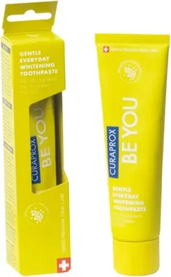 A box and a tube of Curaprox BE YOU Gentle Everyday Whitening Toothpaste.