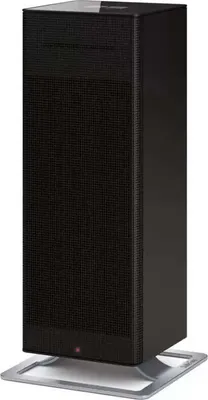 A black tower heater on a silver base.
