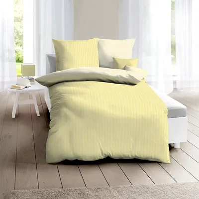 Produktbild von Traumschlaf Mako-Satin Bettwäsche Eternity Combo gelb 155x220 cm + 80x80 cm