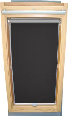 A roller blind installed in a wooden skylight frame.