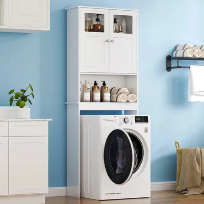 A white cabinet unit is placed over a washing machine in a laundry room setting.