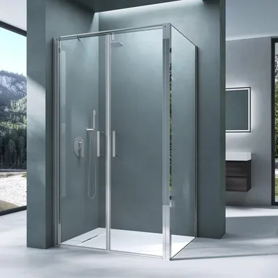 A modern bathroom with a glass shower enclosure.