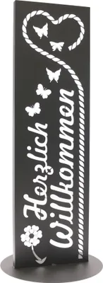 A black garden sign with white lettering and decorative elements.