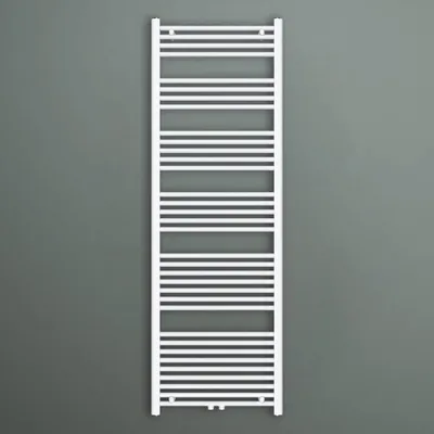 A white radiator against a gray wall.