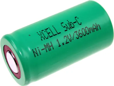 A single green battery with text printed on it, set against a white background.