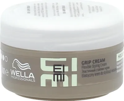 A jar of Wella EIMI Grip Cream hair product.