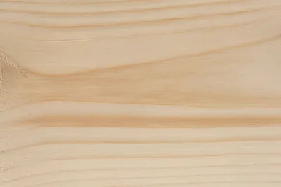 A close-up view of a light-colored wood grain texture.