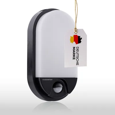 A modern black and white LED outdoor light with a motion sensor, featuring a German brand tag.