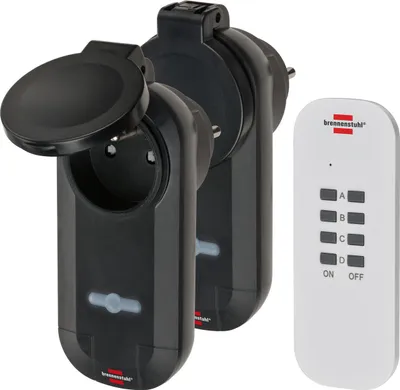 Two remote-controlled power outlets and a remote control are shown against a white background.