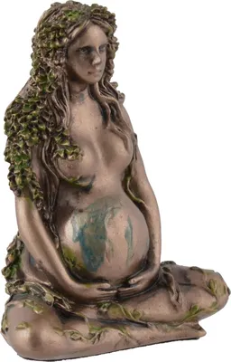 A bronze figurine of a pregnant woman, adorned with green ivy, sitting in a lotus position.