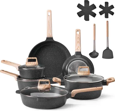 A collection of cookware items arranged on a white background.