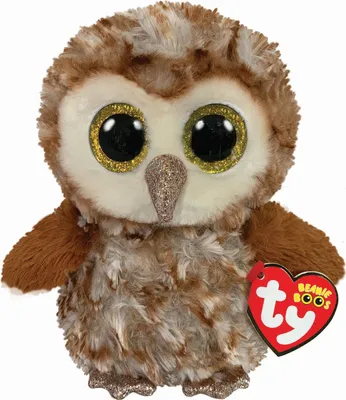 A plush toy owl with large glittery eyes and a glittery beak, sitting on a white background. A red heart-shaped tag with the TY Beanie Boos logo is attached to its wing.