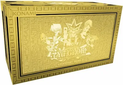 A golden box with Yu-Gi-Oh! characters and hieroglyphics.