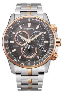 A close-up studio shot of a Citizen Eco-Drive men's watch with a bicolor metal bracelet.
