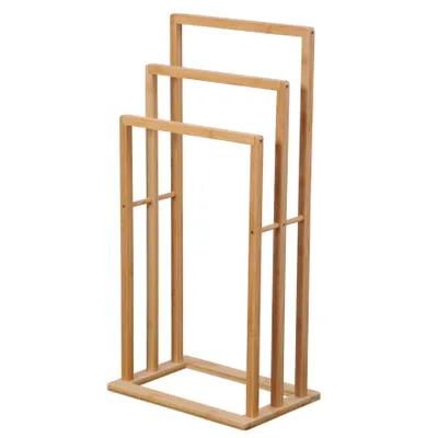A freestanding towel rack made of bamboo.