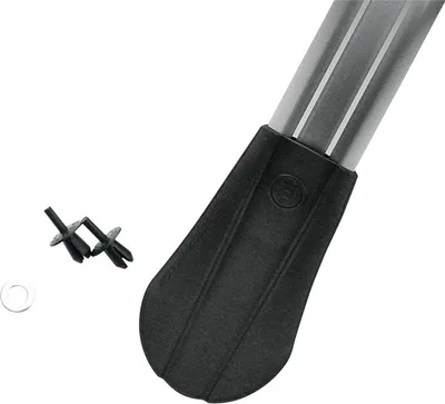 A close-up shot of a black plastic fender extender attached to a silver metal pole, with two black plastic clips and a small white ring in the foreground.