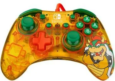 A transparent yellow Nintendo Switch controller with a Bowser design on the right side.