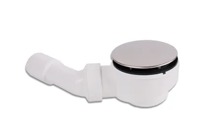 A white shower drain with a silver top is shown against a white background.