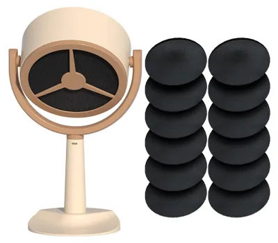 A cream and tan mini range hood is shown next to a stack of black circular filters on a white background.