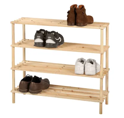 A multi-tiered wooden shoe rack filled with shoes.