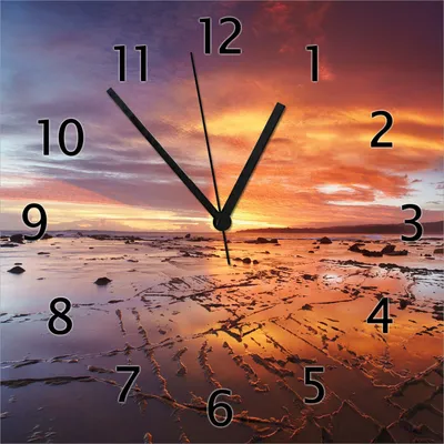 Produktbild von Wallario Design Wanduhr Wattwanderung am Meer bei Sonnenuntergang aus Echtglas, Größe 30 x 30 cm