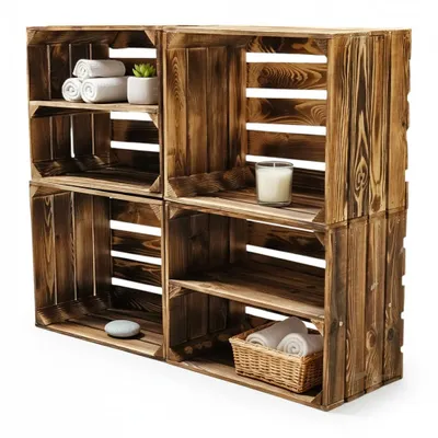 A set of four wooden crates stacked to form a shelving unit, with some decorative items placed inside.