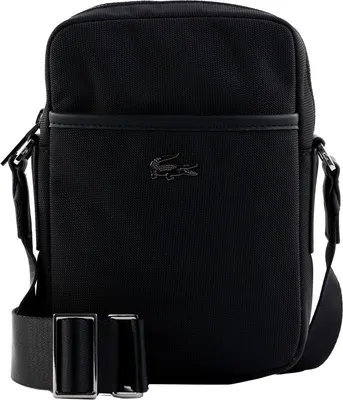 A black Lacoste crossbody bag is shown against a white background.