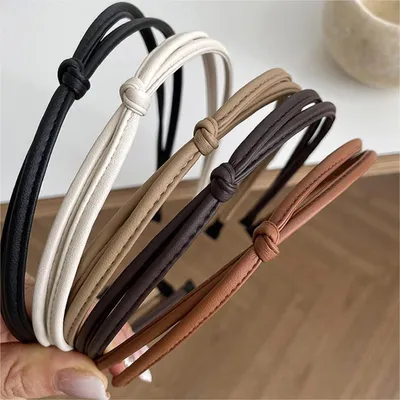 Immagine prodotto di set di 5 fasce per capelli in pelle nera marrone bianca per bambine e ragazze