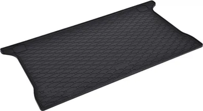 A black rubber car trunk mat with a textured pattern.