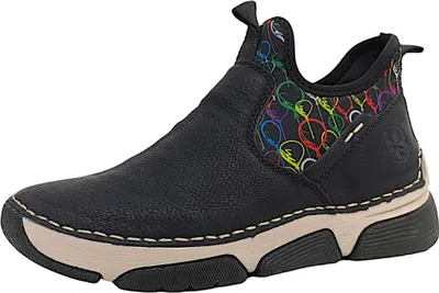 A single black boot with colorful accents on a white background.
