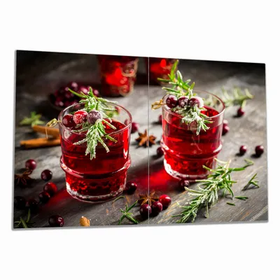 Produktbild von Wallario Herdabdeckplatte aus Glas, Größe 80 x 52 cm 2-teilig, Motiv Winterlicher Cranberry-Punsch mit Rosmarin