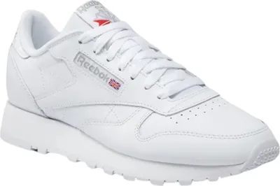 A single white Reebok Classic Leather sneaker is shown from a side angle against a white background.