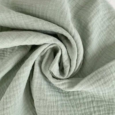 Produktbild von Set mit 12 Baumwolltischsets aus Musselin, 43 x 43 cm