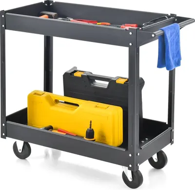 A dark gray two-tier rolling tool cart filled with various tools and toolboxes, set against a white background.