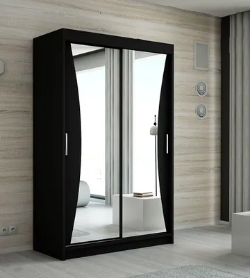 A black wardrobe with mirrored doors stands against a wood-paneled wall.