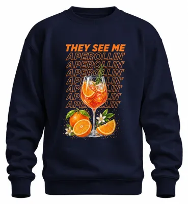 Obrázek produktu pro Mikina s potiskem „They See Me Aperollin'“, s motivem koktejlu Aperol Spritz a oranžového slunce, tmavě modrá, M