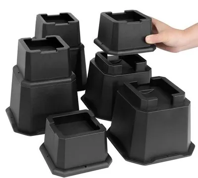 Zdjęcie produktu dla Podwyższenia do mebli JustValue – zestaw 8 sztuk – kółka – 5–15,2 cm – 2721 kg – czarne