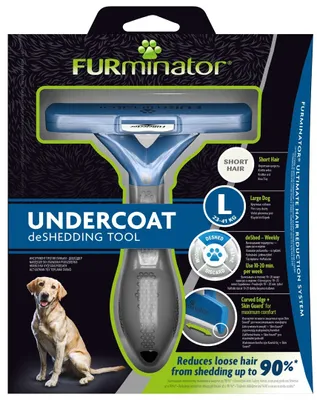 The image shows the packaging of a Furminator Undercoat deShedding Tool for large dogs with short hair. A Labrador Retriever is pictured on the left side of the packaging.
