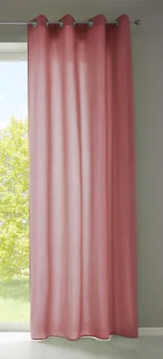 A pink curtain hanging in front of a window with trees visible outside.