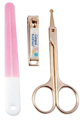 A set of baby grooming tools including scissors, nail clippers, and a nail file, arranged on a white background.