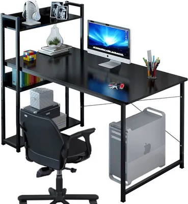 A black computer desk with a computer, chair, and various accessories.