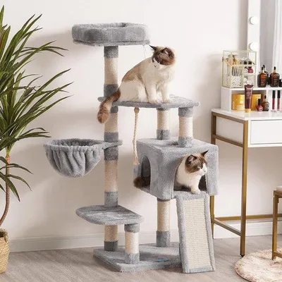 Image de Unyqoos® – Arbre à gratter pour chats : un espace de jeu avec hamac, maison pour chats et distributeur de nourriture surélevé. Structure en bois stable, recouverte de sisal, et conçue pour être anti-basculement